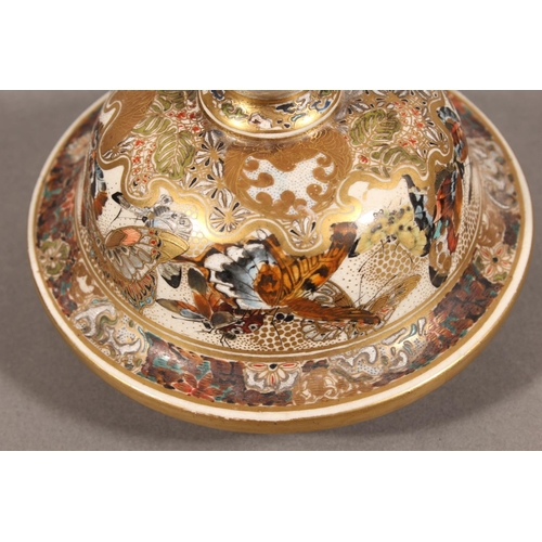 210 - Japanese Satsuma baluster jar and cover, the body decorated with butterflies and chrysanthemums, six... 