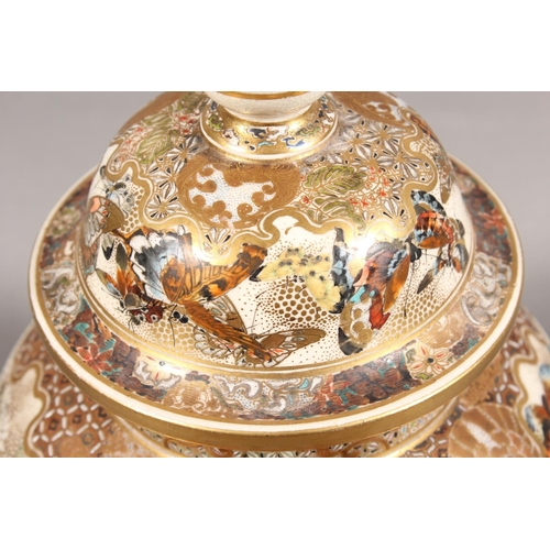 210 - Japanese Satsuma baluster jar and cover, the body decorated with butterflies and chrysanthemums, six... 