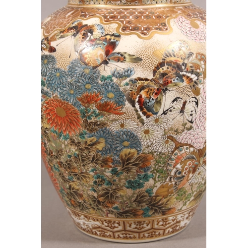 210 - Japanese Satsuma baluster jar and cover, the body decorated with butterflies and chrysanthemums, six... 