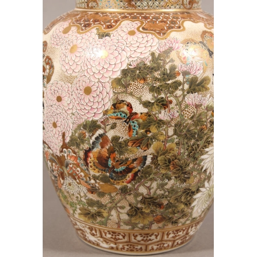 210 - Japanese Satsuma baluster jar and cover, the body decorated with butterflies and chrysanthemums, six... 