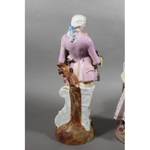 212 - Pair of 19th century porcelain figures of a lady and gentleman holding flowers, the male inscribed '... 