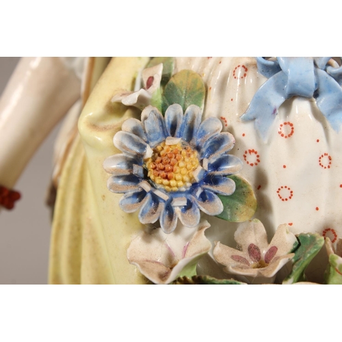 212 - Pair of 19th century porcelain figures of a lady and gentleman holding flowers, the male inscribed '... 