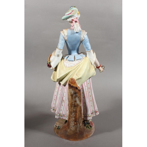 212 - Pair of 19th century porcelain figures of a lady and gentleman holding flowers, the male inscribed '... 