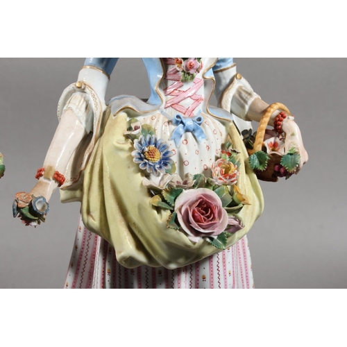 212 - Pair of 19th century porcelain figures of a lady and gentleman holding flowers, the male inscribed '... 
