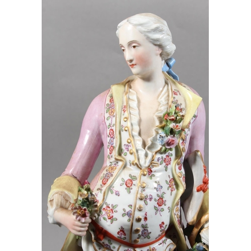 212 - Pair of 19th century porcelain figures of a lady and gentleman holding flowers, the male inscribed '... 
