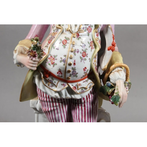 212 - Pair of 19th century porcelain figures of a lady and gentleman holding flowers, the male inscribed '... 