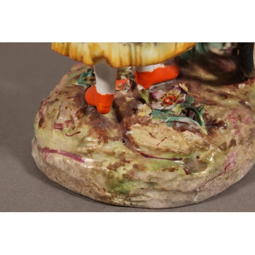 213 - Continental novelty porcelain cream boat in the form of a female flower seller pushing a three wheel... 