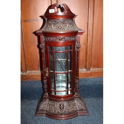 462 - Antique style mahogany wall cabinet having swan neck pediment above relief ribbon and floral frieze,... 