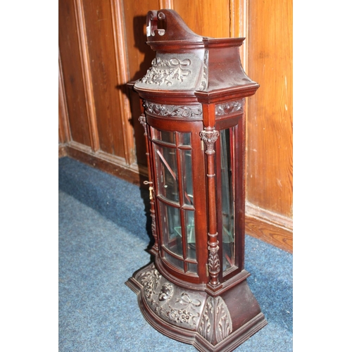 462 - Antique style mahogany wall cabinet having swan neck pediment above relief ribbon and floral frieze,... 