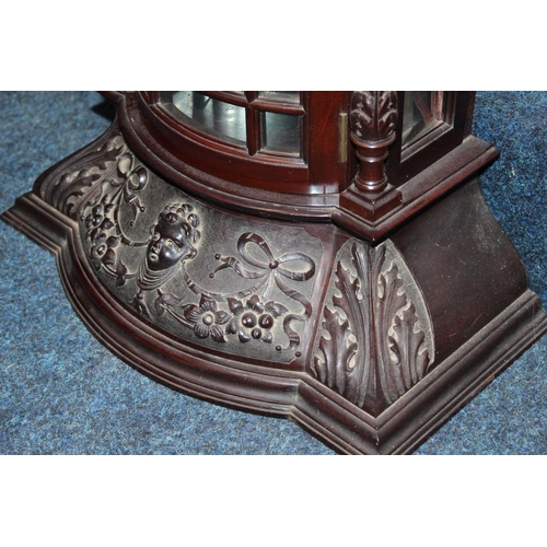 462 - Antique style mahogany wall cabinet having swan neck pediment above relief ribbon and floral frieze,... 