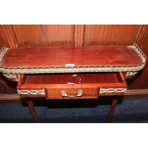 466 - Modern French antique style mahogany pier table of small proportions having ormolu style metal galle... 