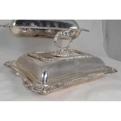 8 - Pair of Edward VII silver entrée dishes and covers of rectangular shape with scroll and gadrooned bo... 