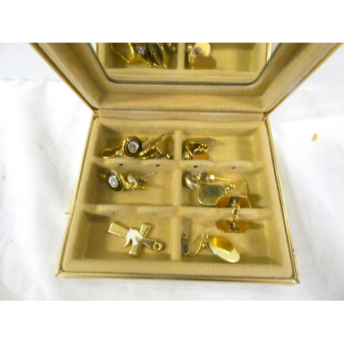 112 - Small box of pin badges and costume jewellery.