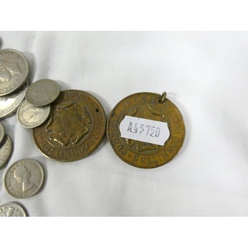 117 - Small tin of British coinage and two commemorative Cumberland medals.