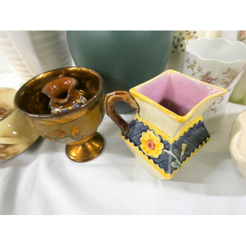 214 - Large collection of vases to include Arthur Woods etc.