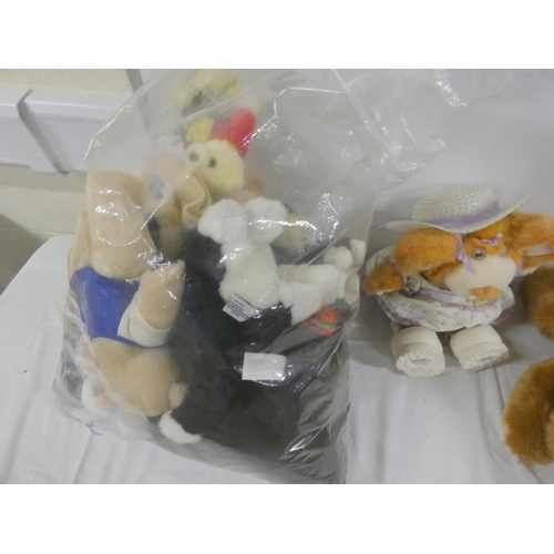 261 - Large bag of soft toys.
