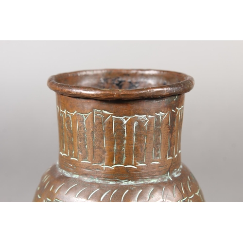 3 - Middle eastern cooper vessel or jug with repousse decoration.