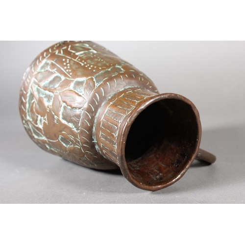 3 - Middle eastern cooper vessel or jug with repousse decoration.