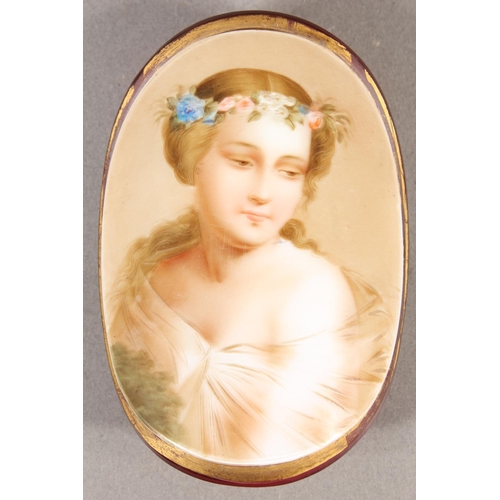 7 - Glass roundel depicting a Victorian figure with head dress, 11cm.