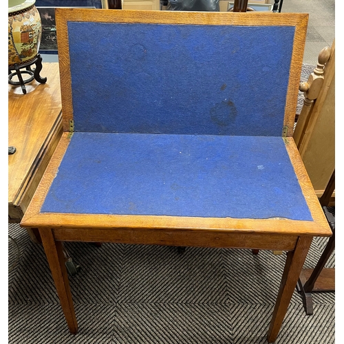 Oak fold-out card table.