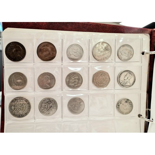 Collectors folder containing eleven sheets of world coins