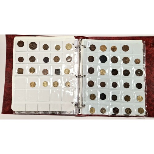Collectors folder containing eleven sheets of world coins