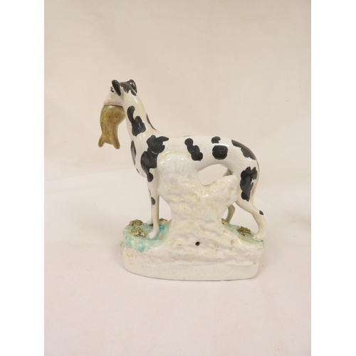 84 - Pair of Victorian Staffordshire pottery black and white Disraeli greyhound figures, one with a hare ... 