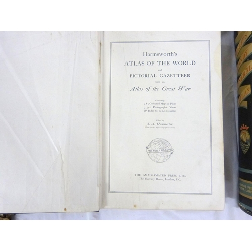324 - Two large atlases to include new atlas of the world and Phillips handy general atlas 1934.
