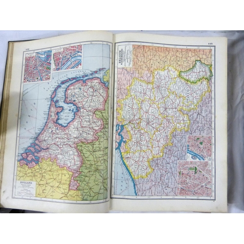 324 - Two large atlases to include new atlas of the world and Phillips handy general atlas 1934.