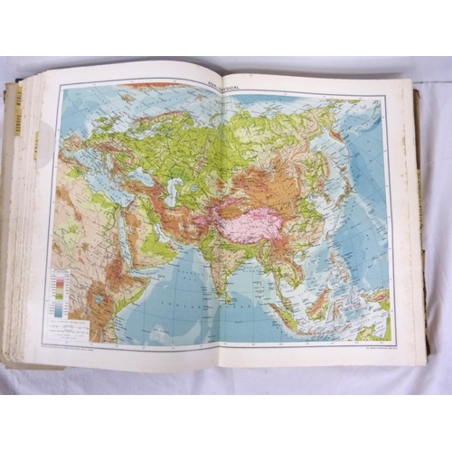 324 - Two large atlases to include new atlas of the world and Phillips handy general atlas 1934.