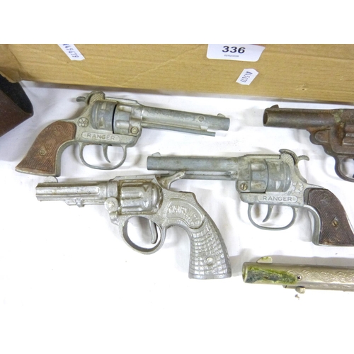 336 - Collection of vintage toys to include diecast guns such as Lone Ranger, 1950's Fairlite rolling stoc... 