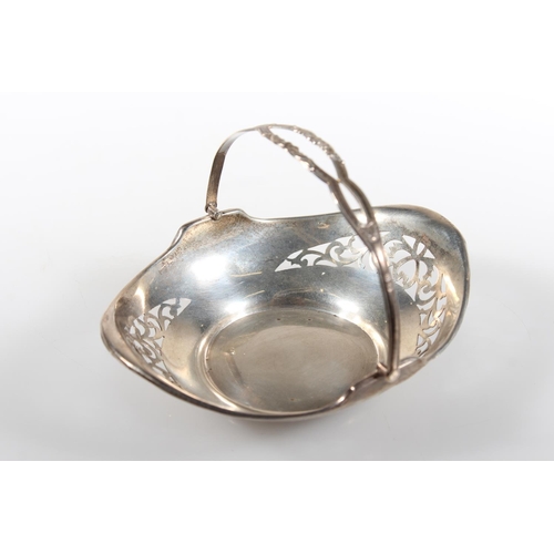 472 - Silver swing handled pierced basket, maker HM, Birmingham, 45g.
