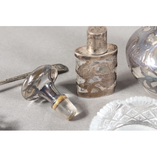 473 - Collection of silver plated flatware, silver onlaid scent bottle and another, a silver topped glass ... 