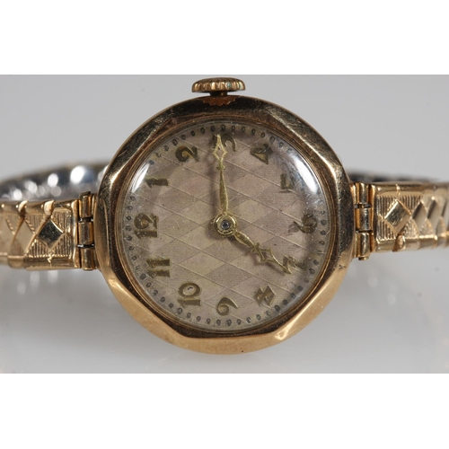 475 - Ladies 9ct yellow gold cased wristwatch.