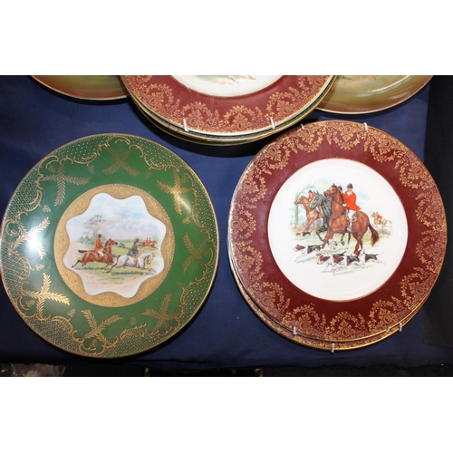 46 - Pair of English porcelain dishes decorated with fox hunting scene vignettes against a green ground, ... 