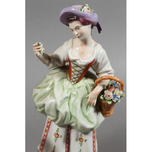 48 - Pair of Saxe of Germany porcelain figures modelled as a gentleman resting on a spade and a female ho... 