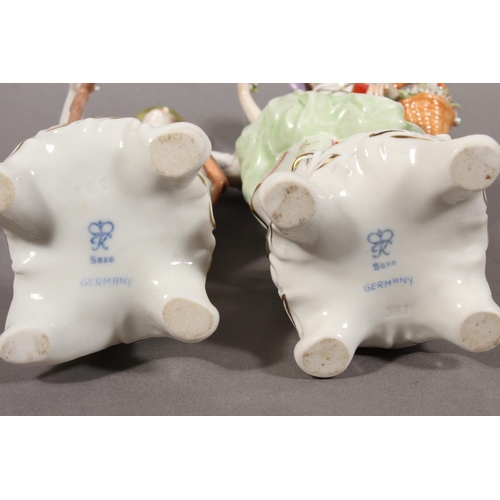 48 - Pair of Saxe of Germany porcelain figures modelled as a gentleman resting on a spade and a female ho... 