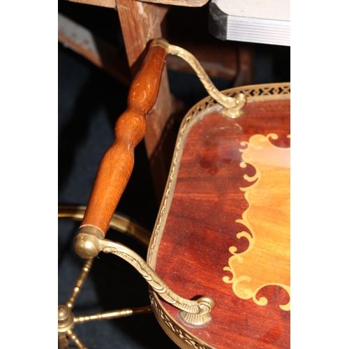 559 - Italian style marquetry inlaid drinks trolley.