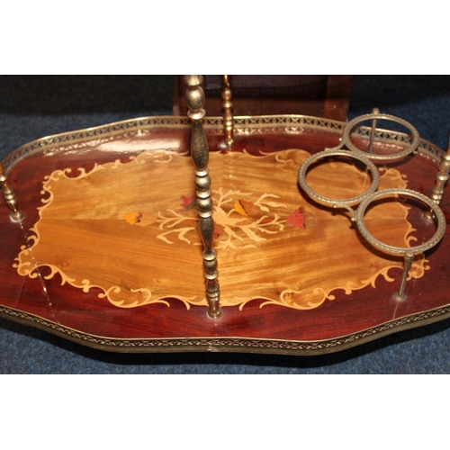 559 - Italian style marquetry inlaid drinks trolley.