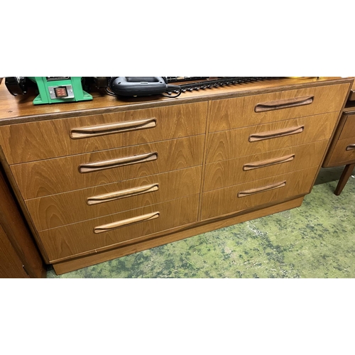 504 - G-Plan four piece tea bedroom suite comprising wardrobe, chest, bedside and mirror backed dressing t... 