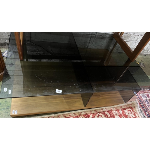 508 - Glass top teak designer coffee table.&nbsp;