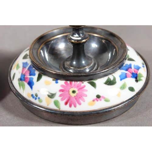 10A - Pair of silver plated and ceramic based antique style candlesticks.