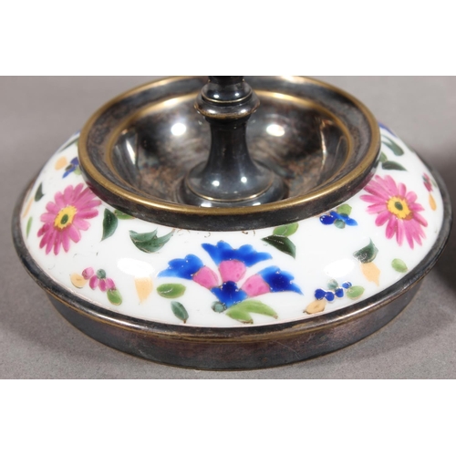 10A - Pair of silver plated and ceramic based antique style candlesticks.