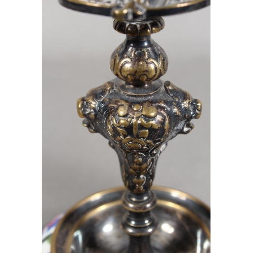 10A - Pair of silver plated and ceramic based antique style candlesticks.