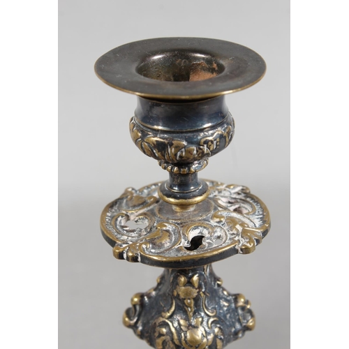 10A - Pair of silver plated and ceramic based antique style candlesticks.