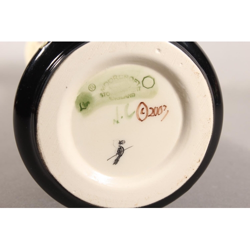 244 - Moorcroft pottery Sweet Pea pattern vase, 31cm tall.