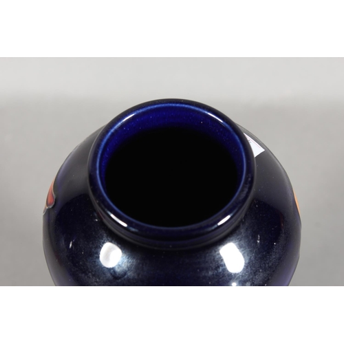 245 - Moorcroft pottery Parasol Dance vase designed by Kerry Goodwin, 21cm tall.