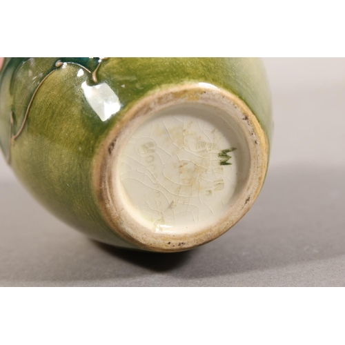 248 - Moorcroft pottery Hibiscus pattern vase, 9.5cm tall.