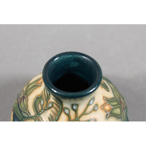 249 - Moorcroft pottery miniature pottery vase, 6cm tall.