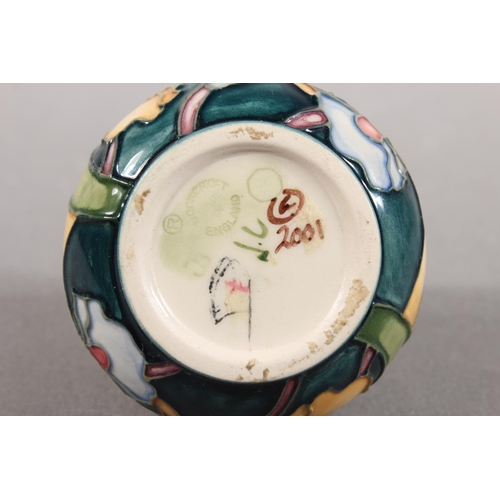 249 - Moorcroft pottery miniature pottery vase, 6cm tall.